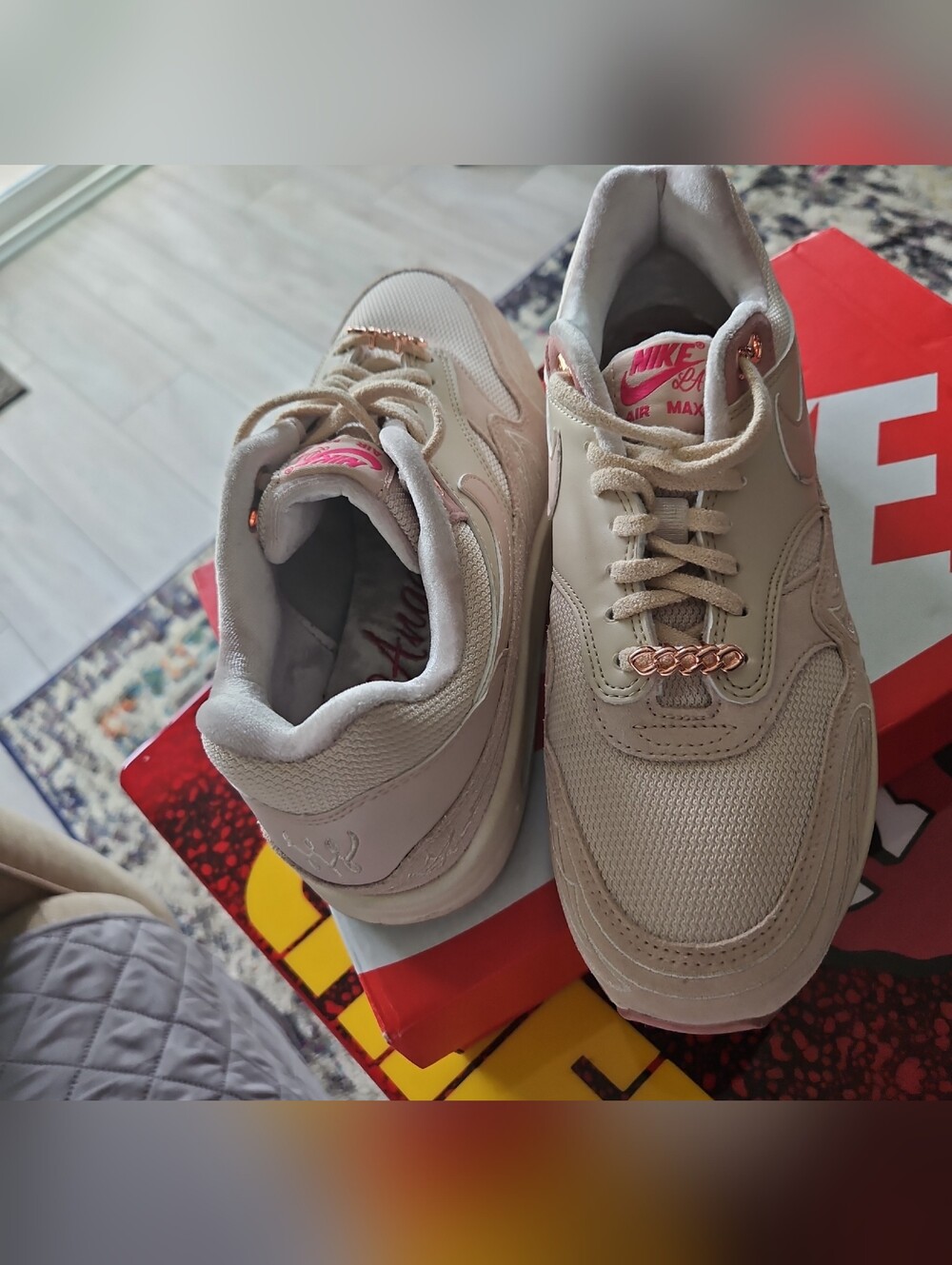 Nike Beige Sneakers with Pink Accents and Rose-Gold Hardware